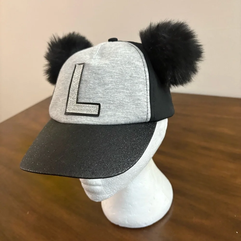 Justice Girls Black Hat Letter L with Pom Poms
